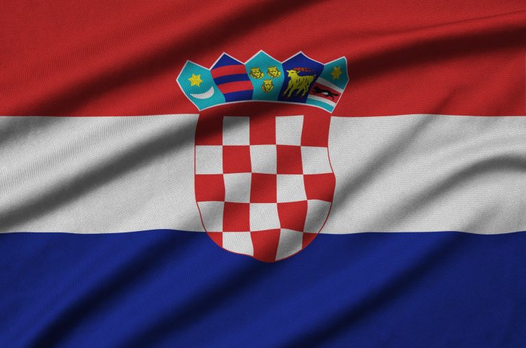 croatia flag is depicted on a sports cloth fabric with many folds sport team waving banner
